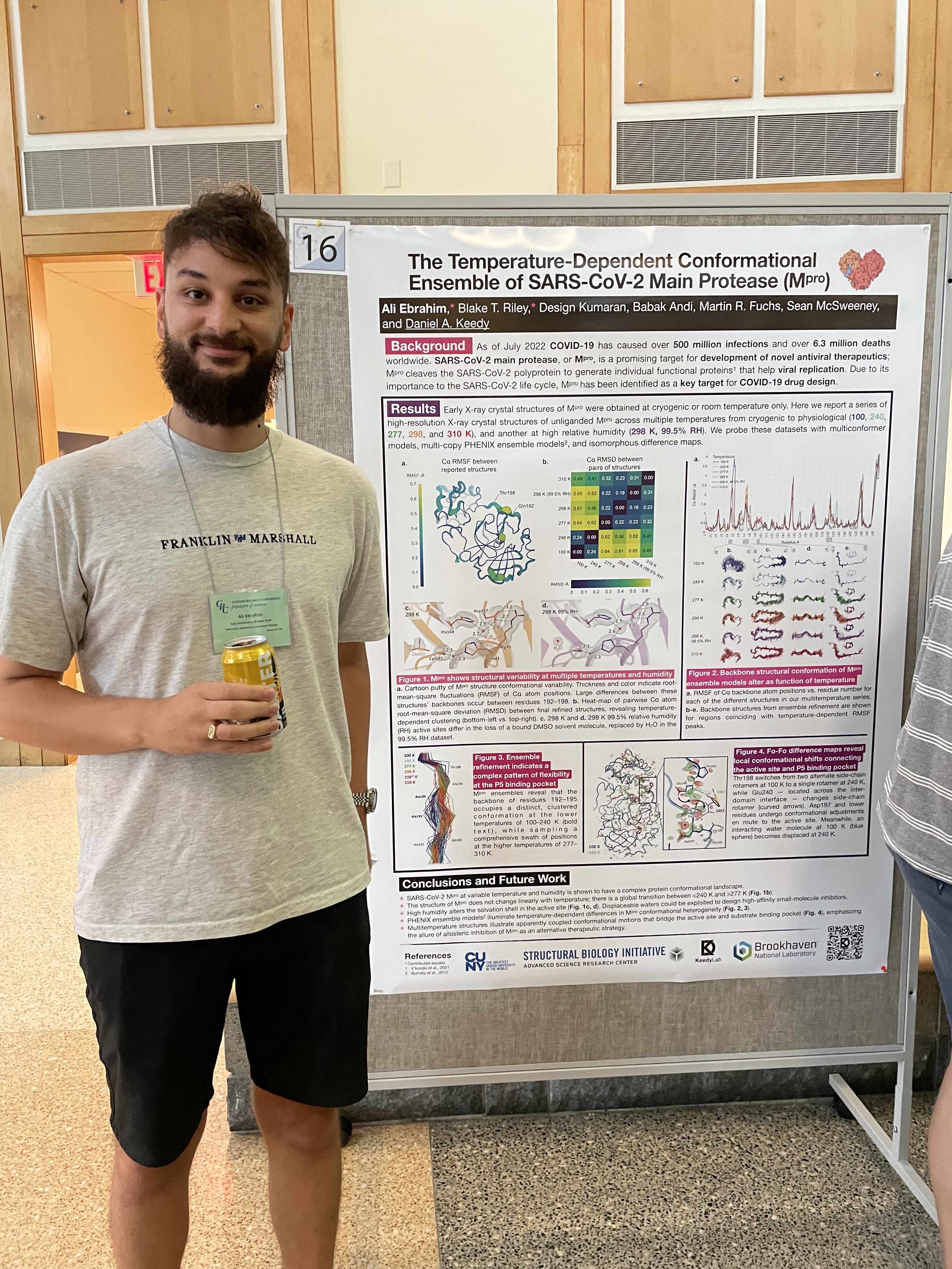 Ali in front of his prize-winning GRS poster