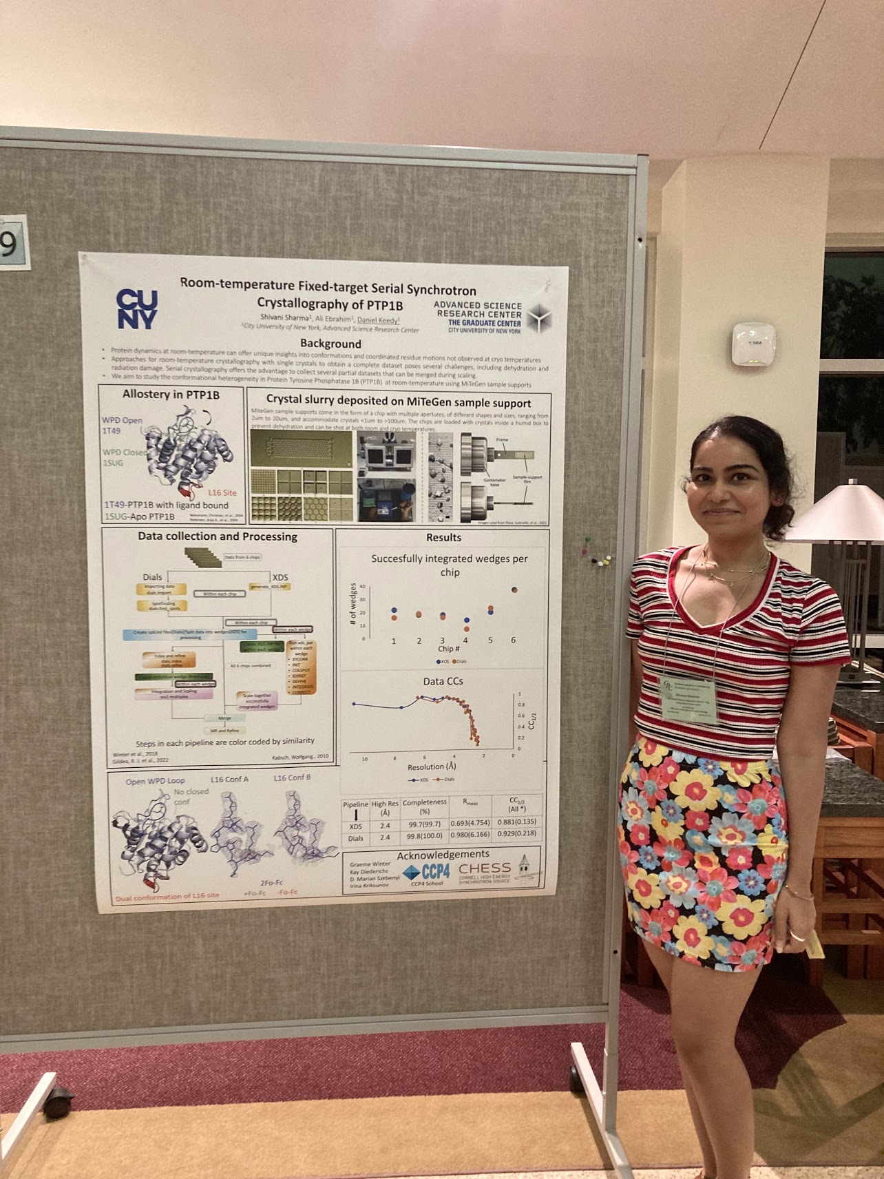 Shivani in front of her GRS/GRC poster