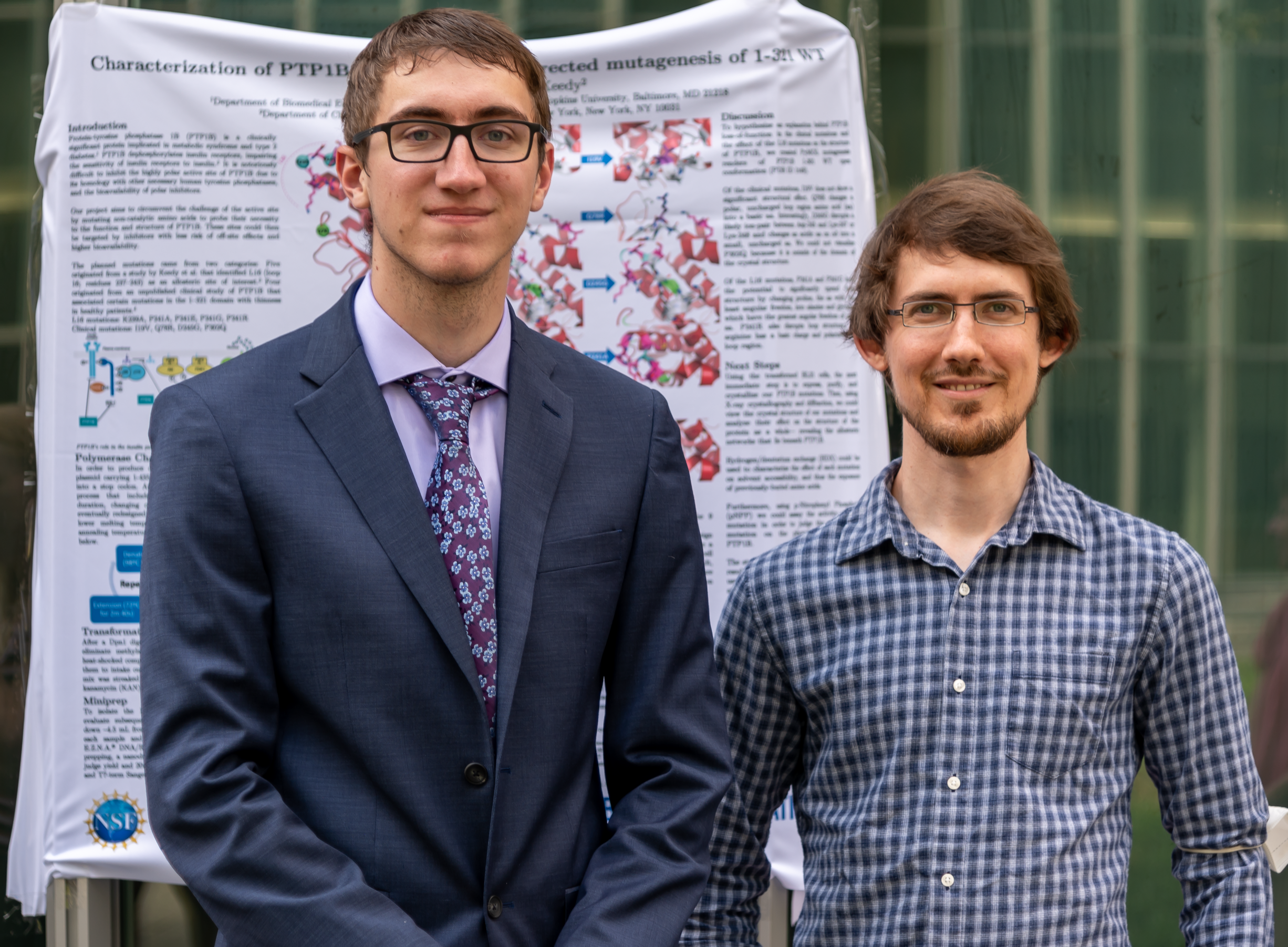 DK visits Jackson's REU research poster