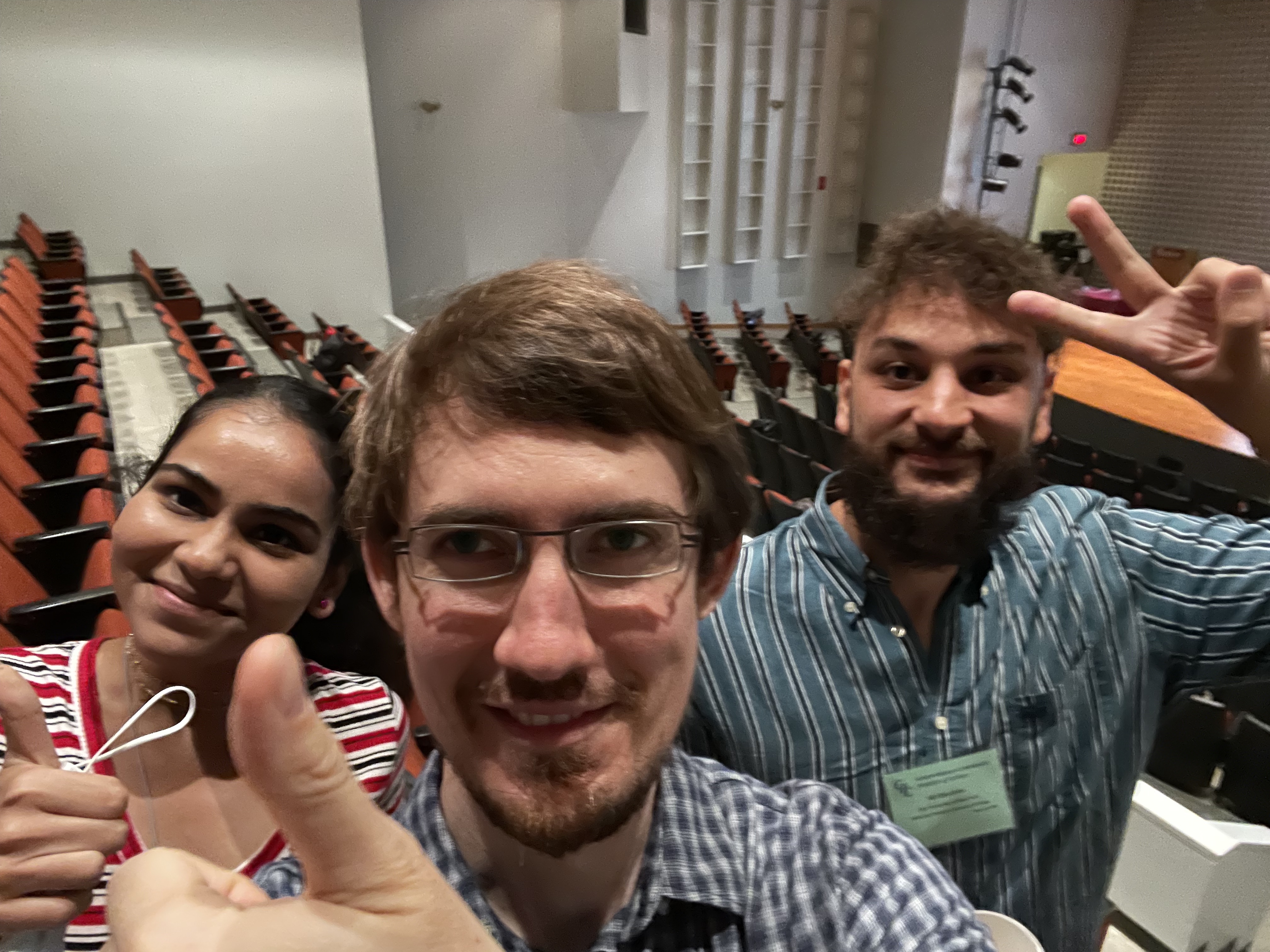 Shivani, Ali, and DK celebrate submitting a paper at the GRC